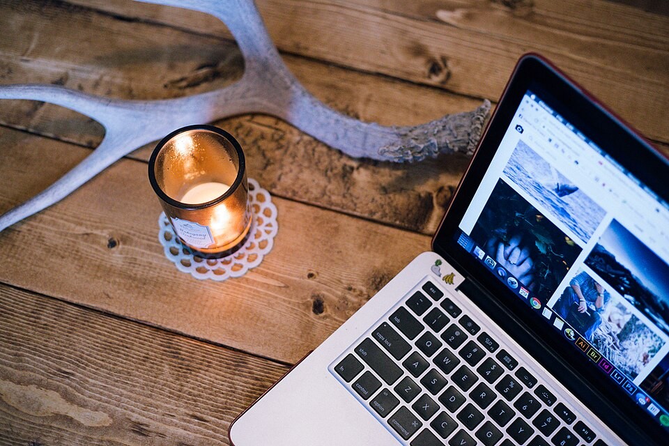 Your Manager Makes a Counteroffer After You Decide to Leave A laptop and candle on a wooden desk with an antler